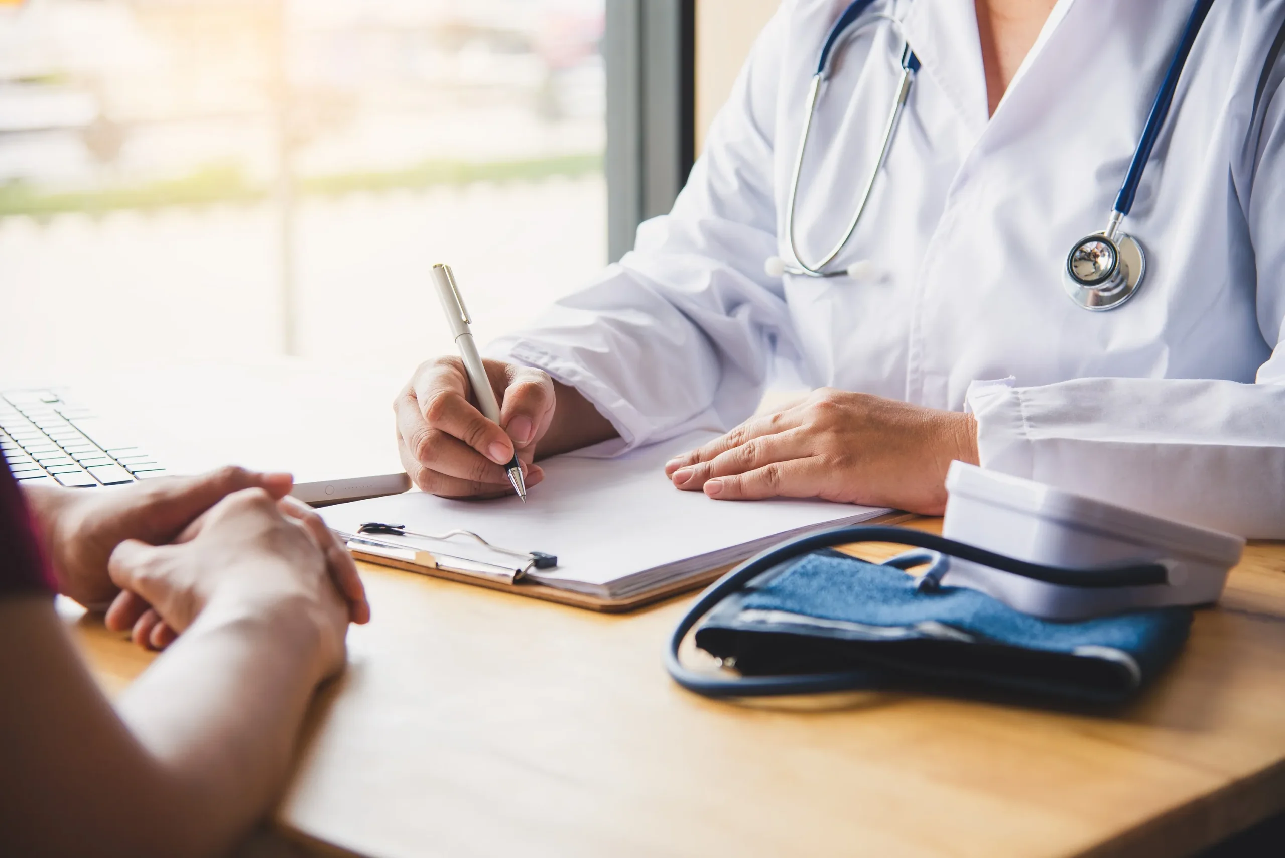 A doctor talking with a patient.