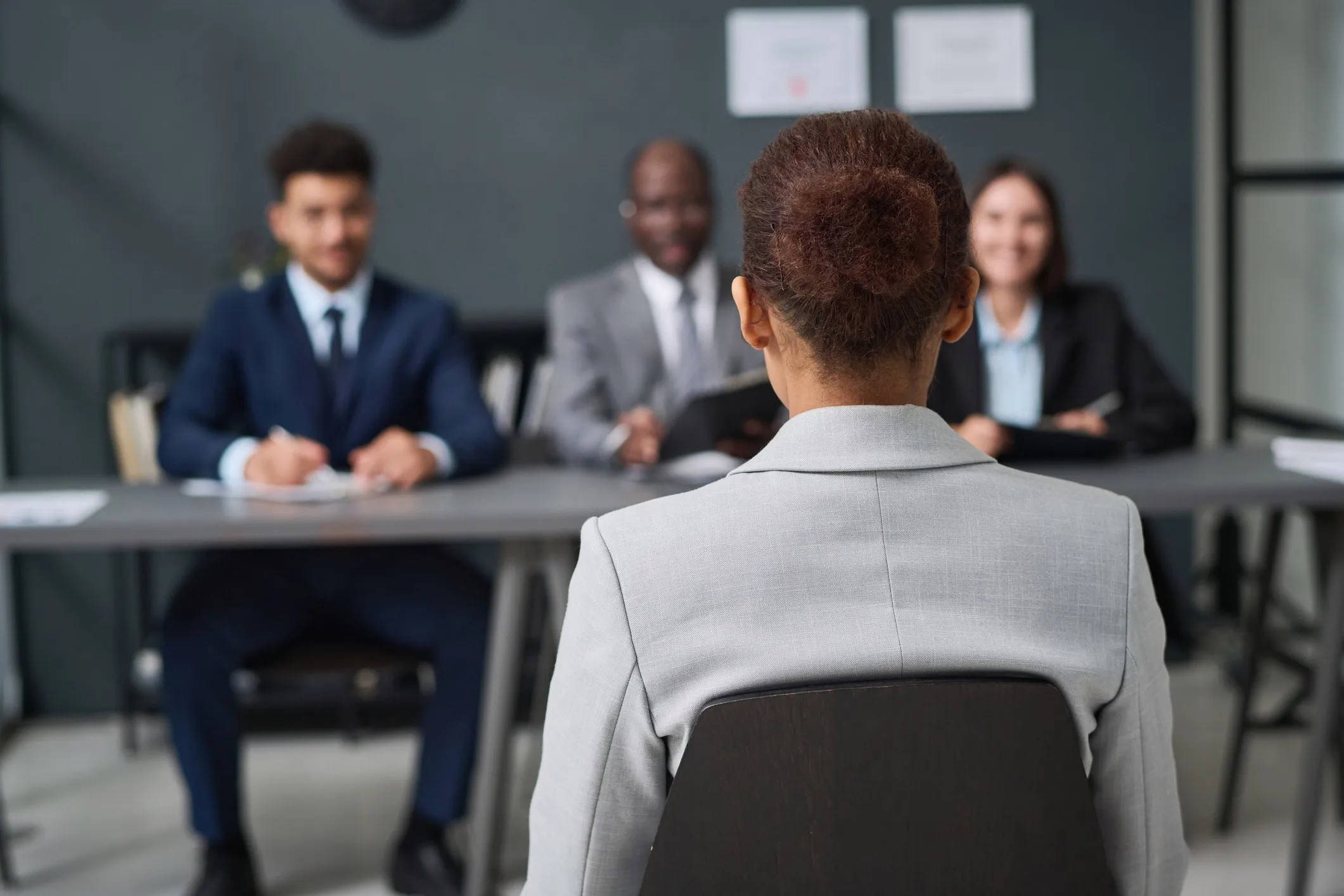 An employee facing a panel.