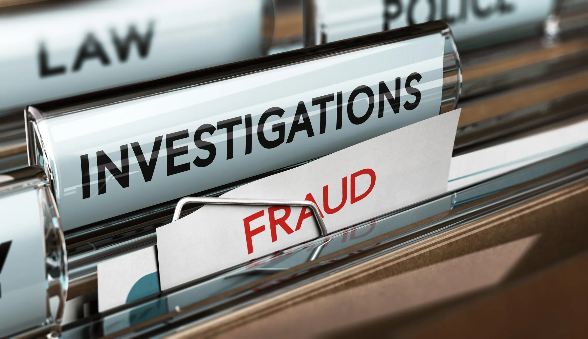 Fraud investigation folders.